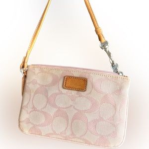 COACH wristlet baby pink light-wash Signature C denim.